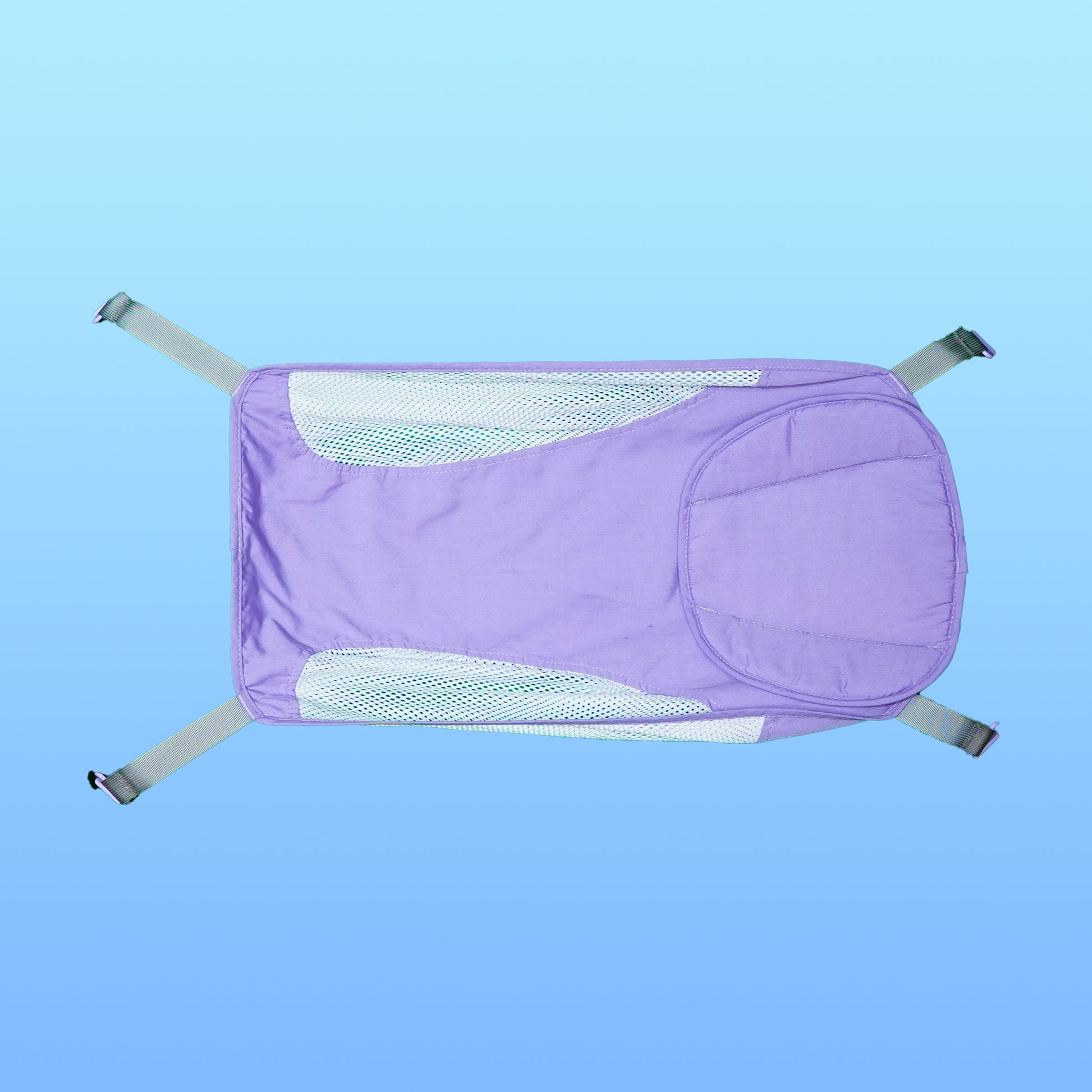 Purple baby bath hammock attached to a safety bathtub, designed for newborn comfort and support in the bath tub.